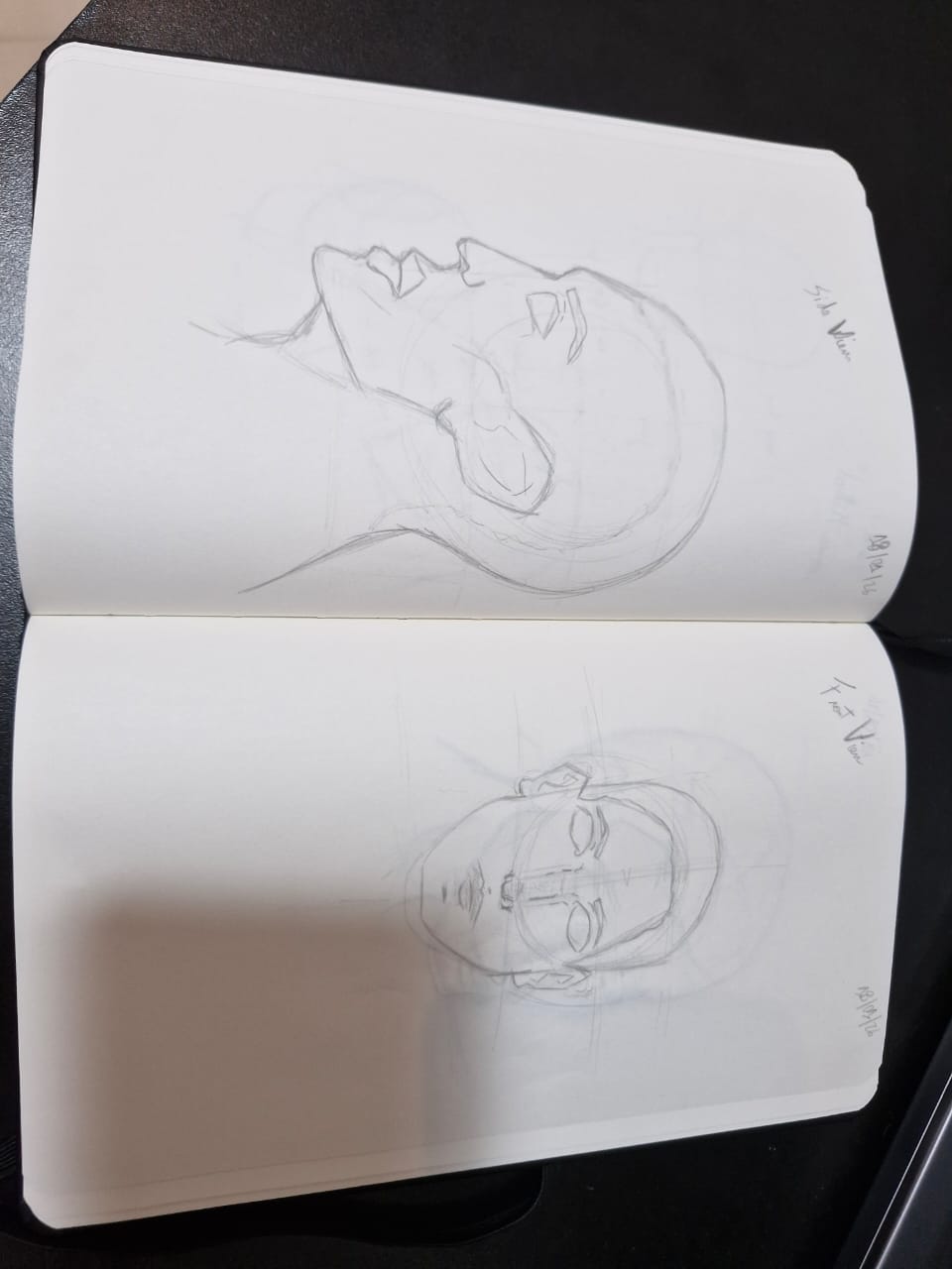 Heads drawing done with pencil